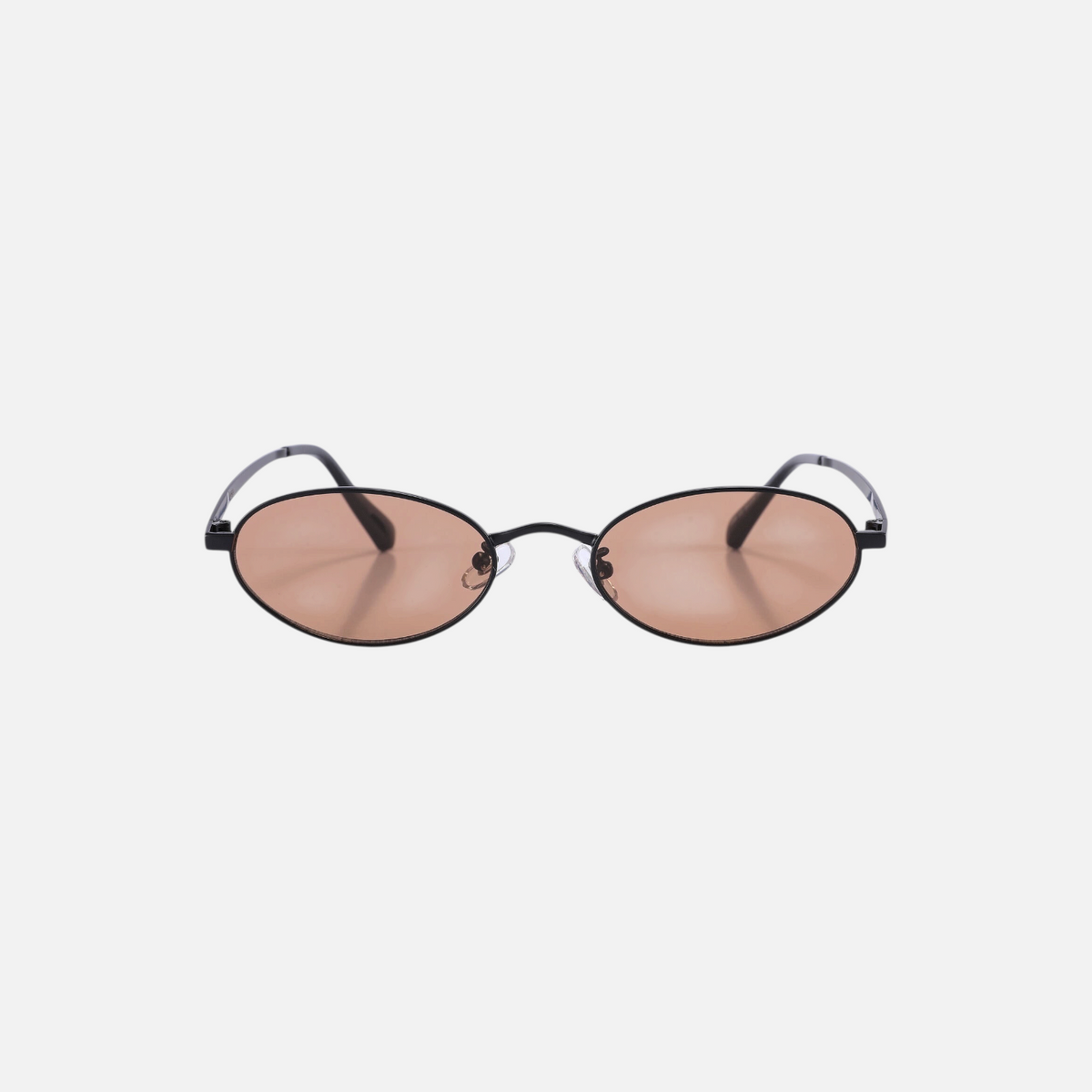 Miraje oval frame sunglasses with a black metal frame and warm amber-tinted lenses on a white background.