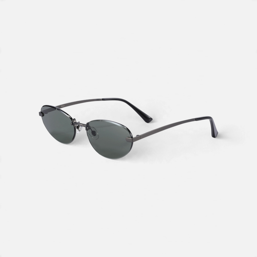Miraje oval rimless sunglasses with gunmetal metal frames and dark tinted lenses on a white background