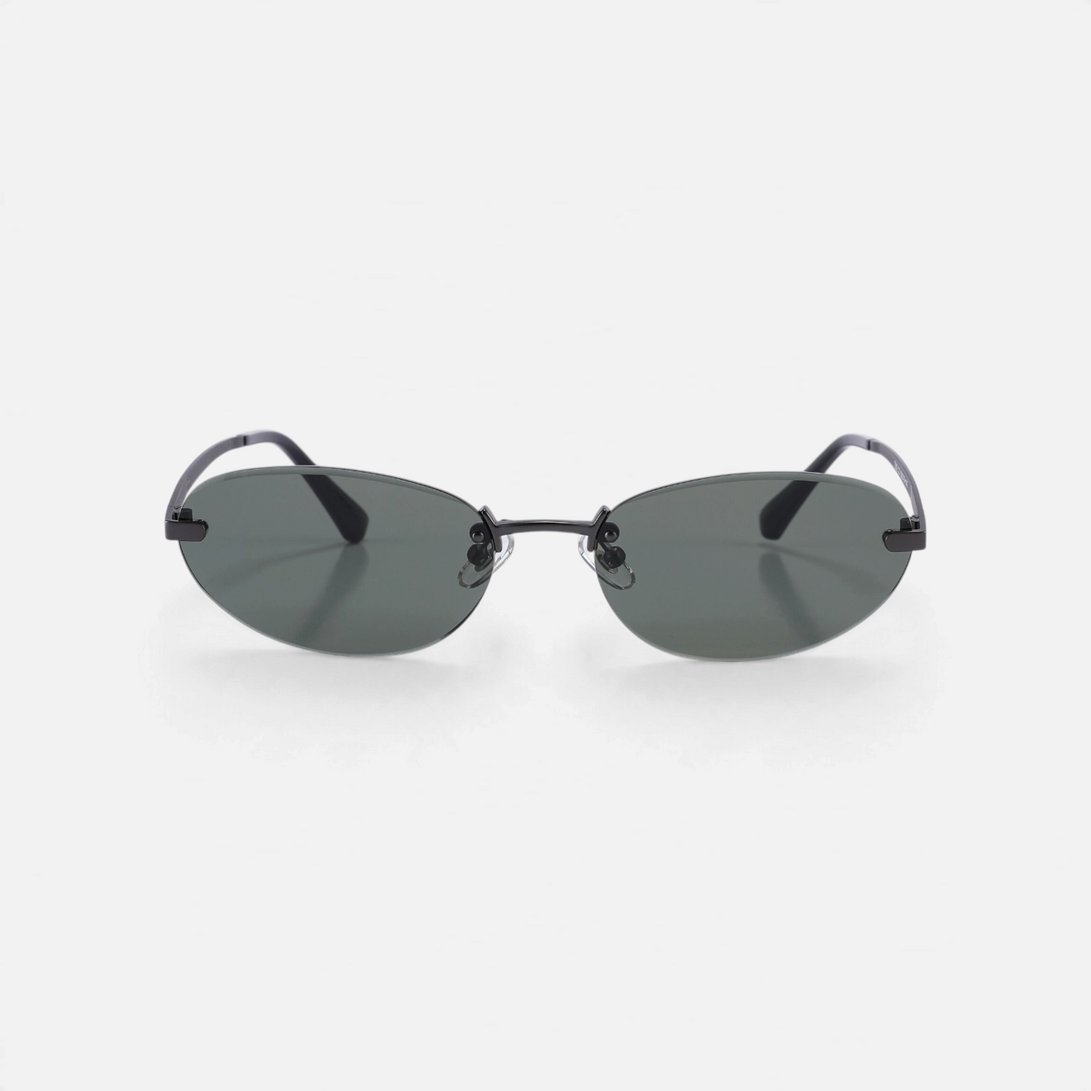Miraje oval rimless sunglasses with gunmetal metal frames and dark tinted lenses on a white background.